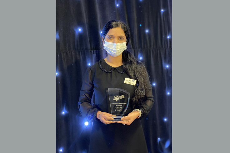 Dr Bosky Nair with award