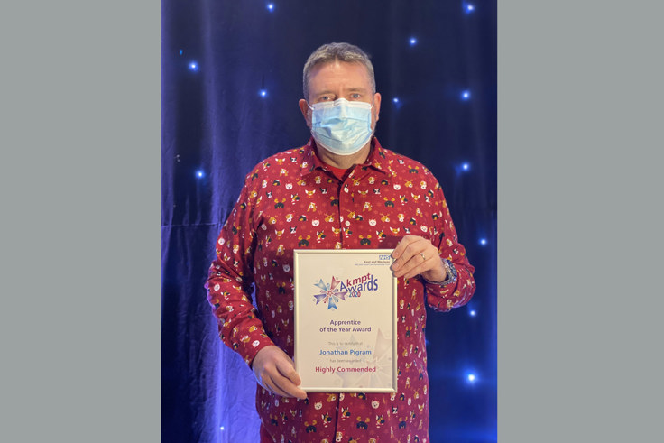 Jonathan Pigram with award