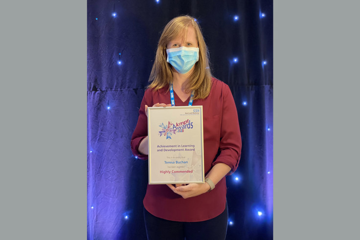 Teresa Buchan with certificate