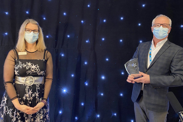 Jacquie and Malcom Brown with award