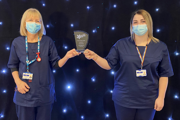 Kim Terry and Kerry Scutts with award