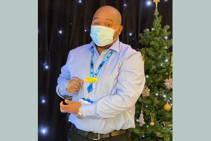 Greylin Mabaso Mlilo with award