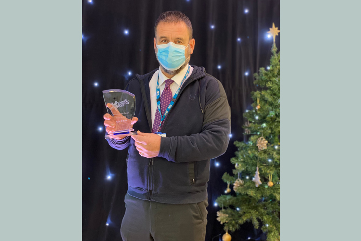 Richard Buxton with award
