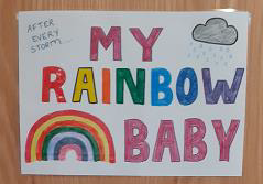 Hand drawn rainbow with the text 'My rainbow baby'