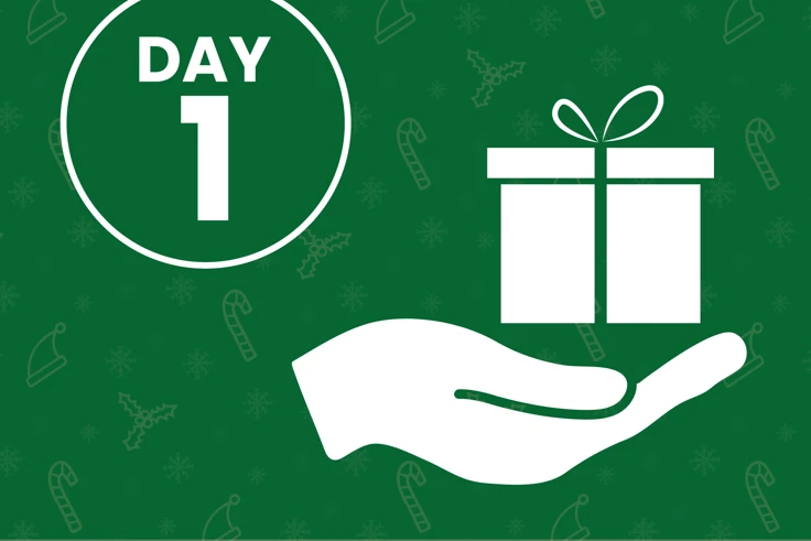 Hand holding a present . The gift of Kindness, day 1